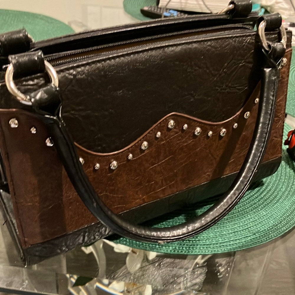 Beautiful purse. Name brand as pictured. Very very good shape